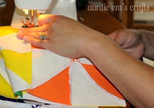 Sharing the Craft of Quilting with a Rainbow Pinwheel Quilt | AuntieEmsCrafts.com